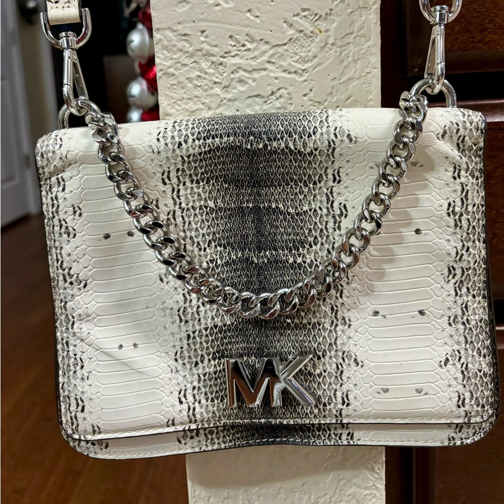 Michael Kors small shoulder snake skin leather shoulder bag.